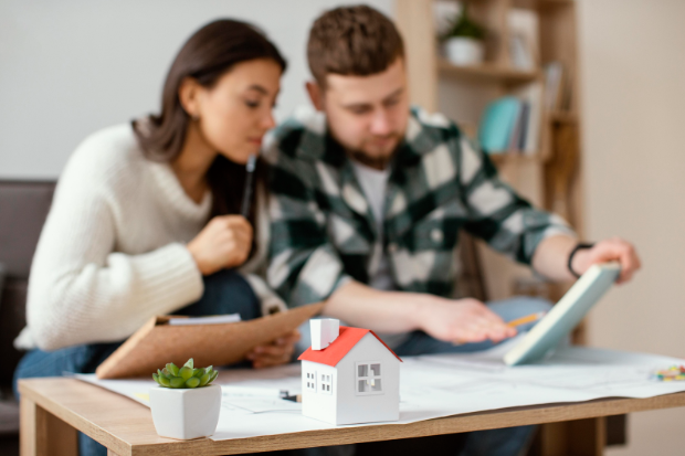 va home renovation loan | texas veteran va home loans veteran homeowner reviewing renovation plans using a va home renovation loan in texas